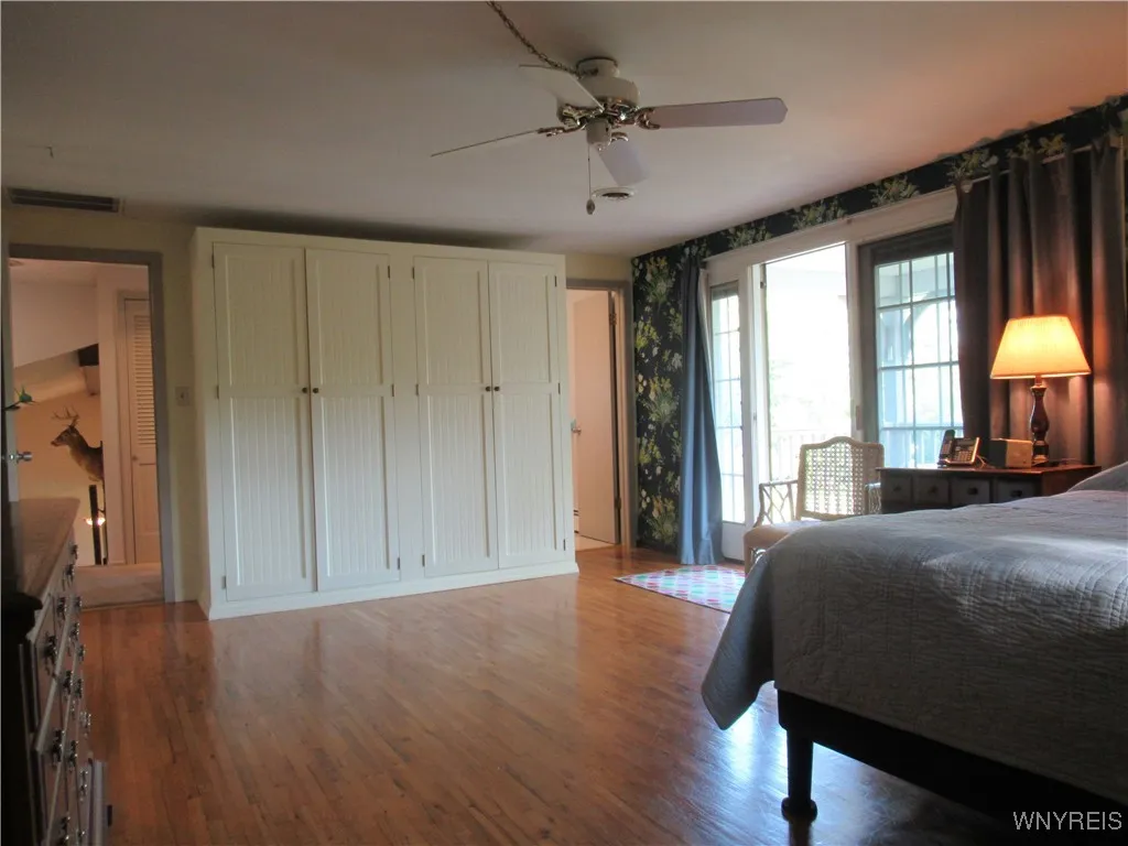 Custom Made Wall of Amazing Storage - Sliding Door to Relaxing Covered Balcony!