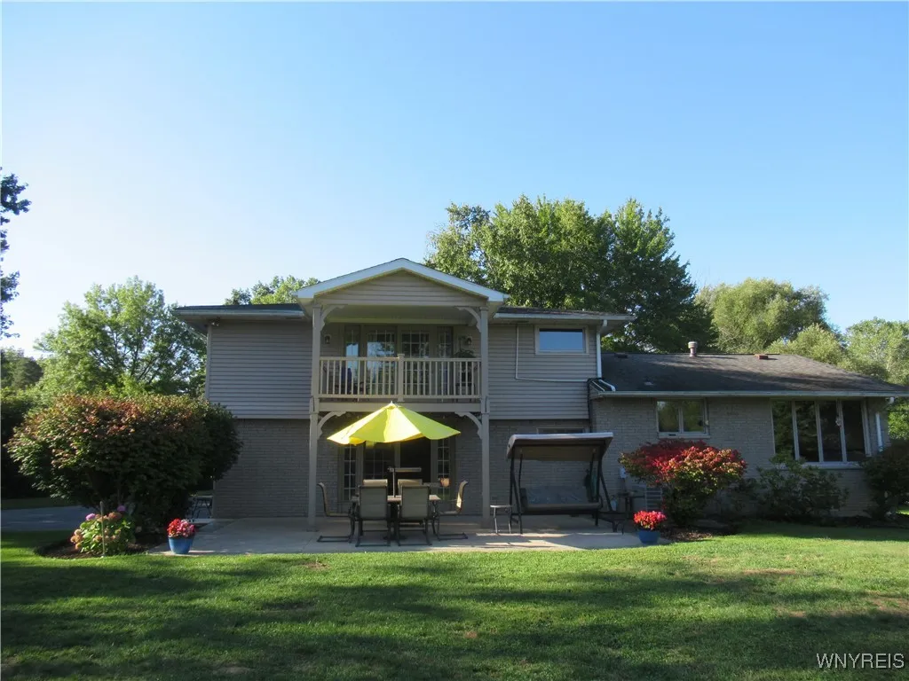 Outdoor Balcony off Primary Bedroom On 2nd Level - Partially Covered Patio off Family Room - Low Maintenace Landscaping, Sure is PRETTY!