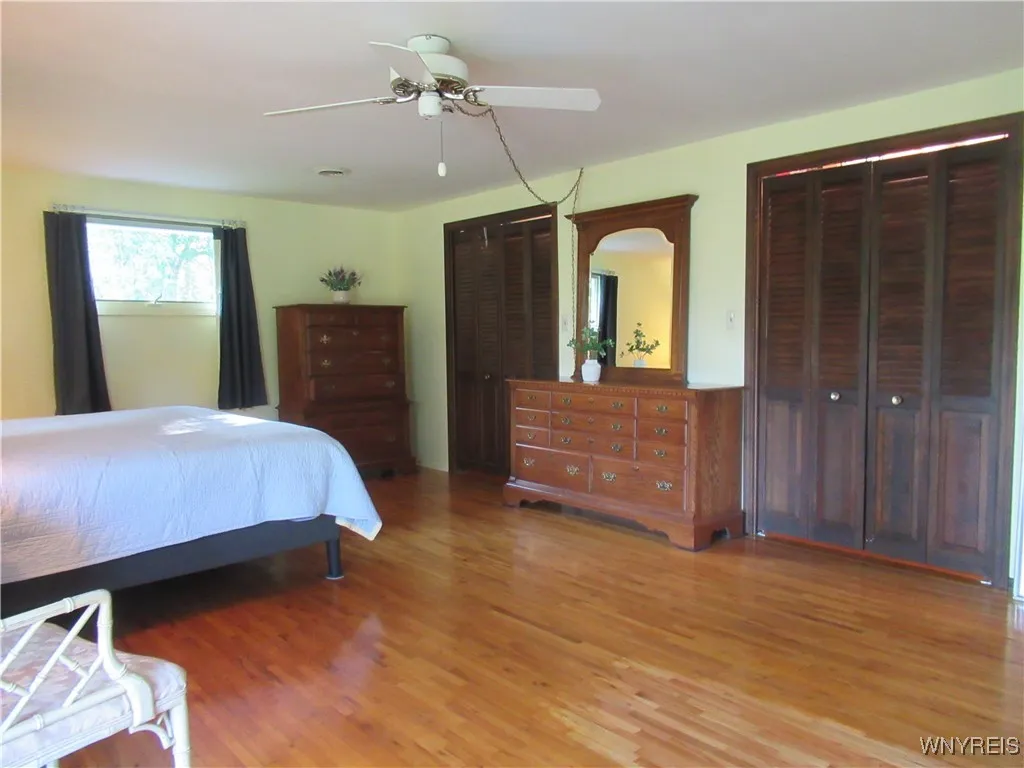 Primary Bedroom w/Huge Double Closets! Gorgeous Wood Floors!