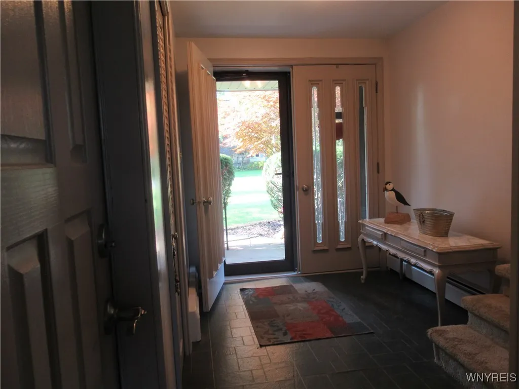 Grand Entryway Large Coat Closet - Access to Garage