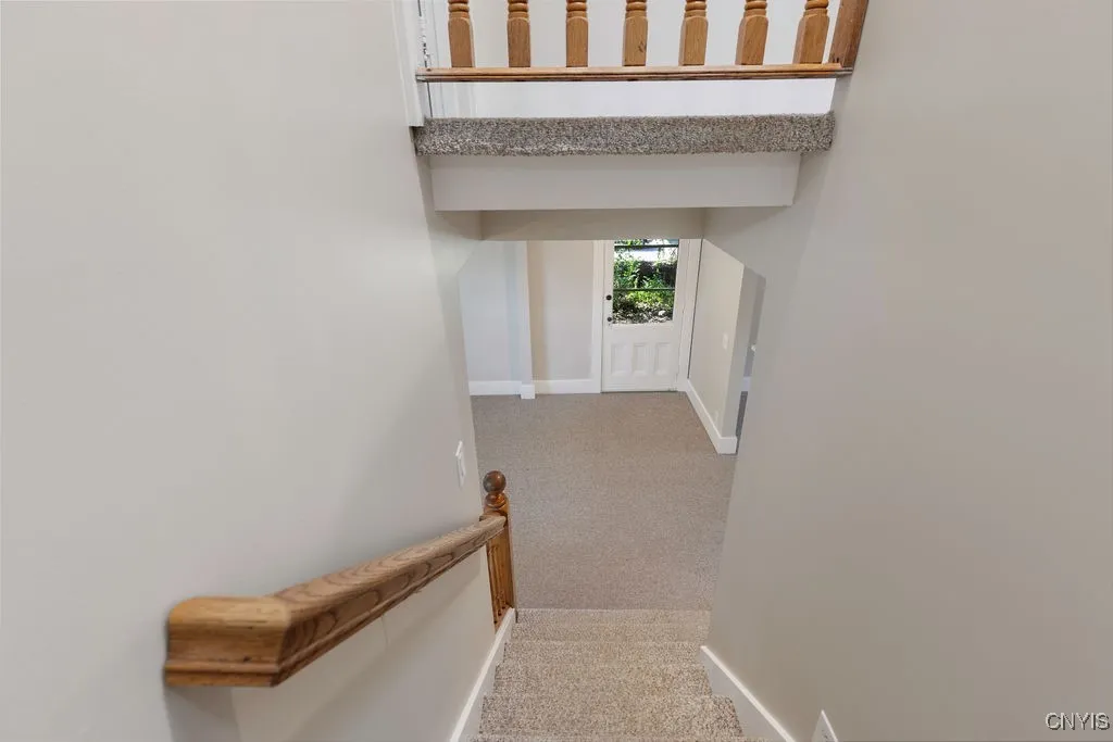 View from stair landing to first floor.