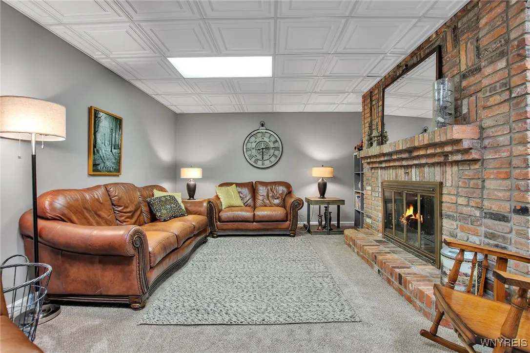 Finished basement with 3rd wood burning fireplace