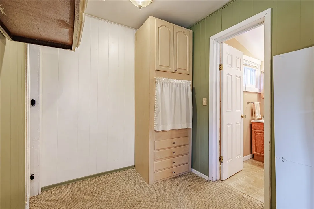 linen closet outside bathroom