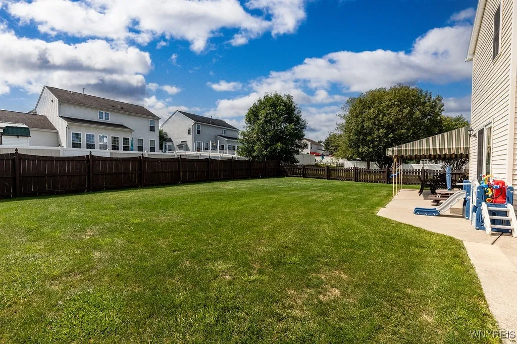 The yard is spacious enough to host a friendly football game!