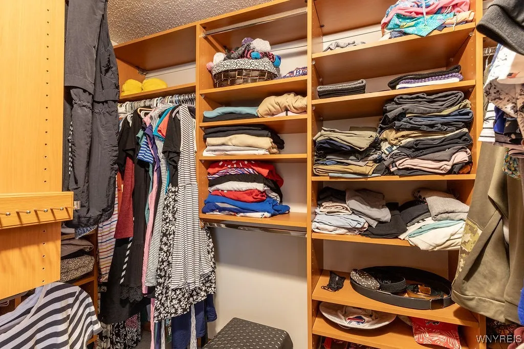 Custom storage in primary​​‌​​​​‌​​‌‌​‌‌​​​‌‌​‌​‌​‌​​​‌​​ closet