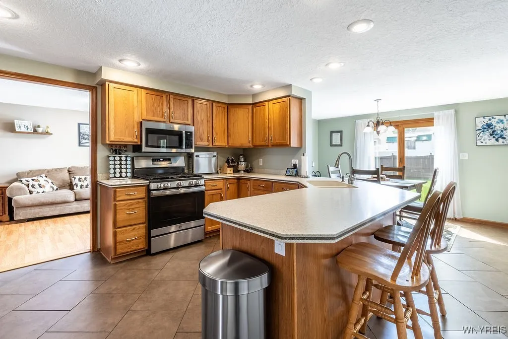 Large kitchen with peninsula and seating