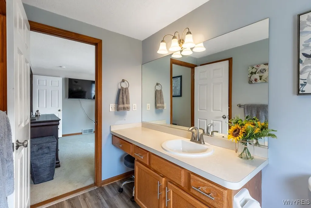 Sink, faucet and flooring have all been updated