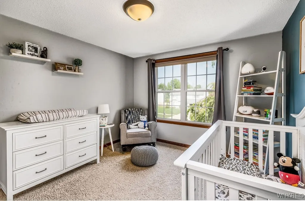 2nd bedroom upstairs with ample natural light