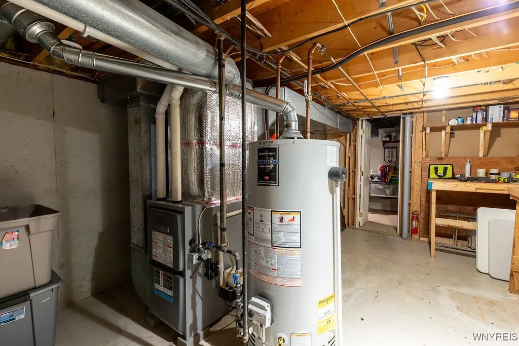 Utility area in basement with updated furnace (2022)