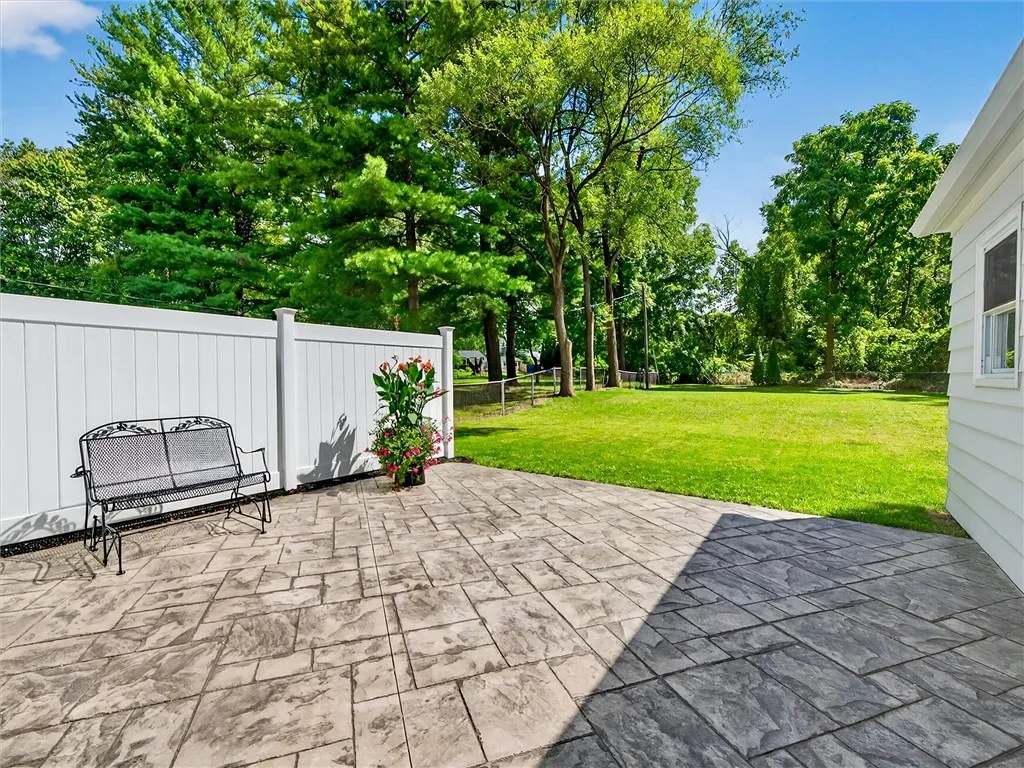 Stamp concrete patio with privacy fence