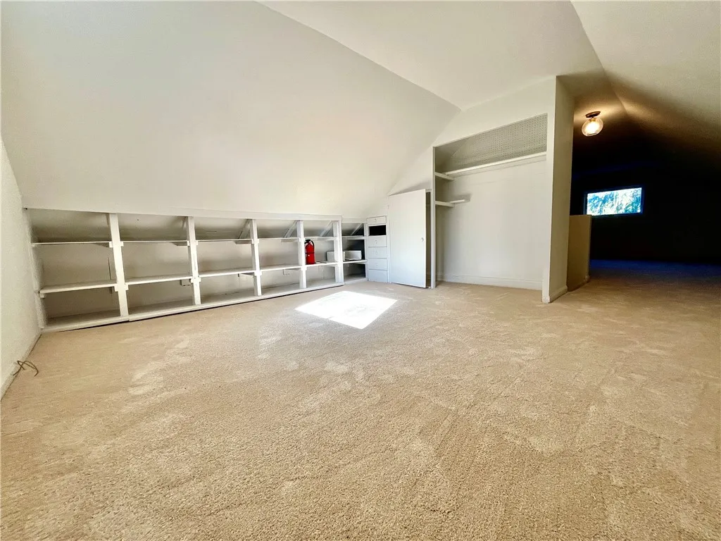 Closet and shelving in the 3rd floor bedroom/loft area. New heating has been added to this space