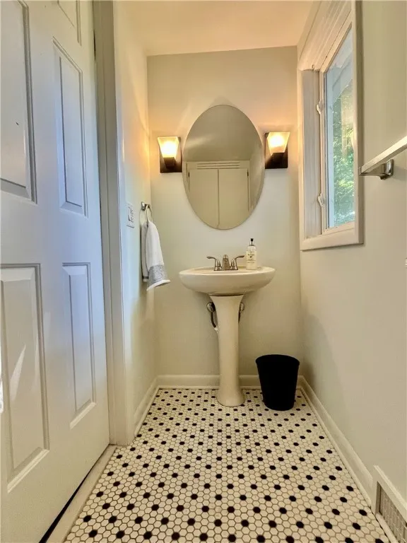 The powder room off the side entrance