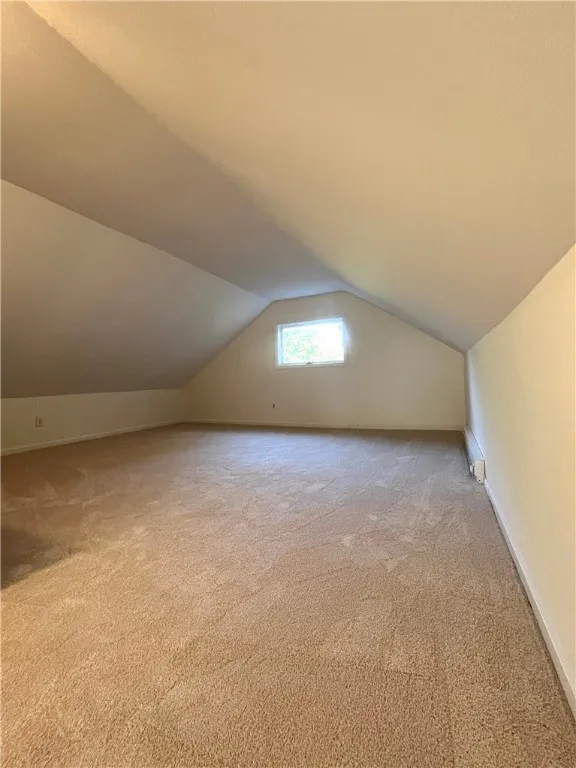 The spacious 3rd floor bedroom/loft area. New heating has been added to this space