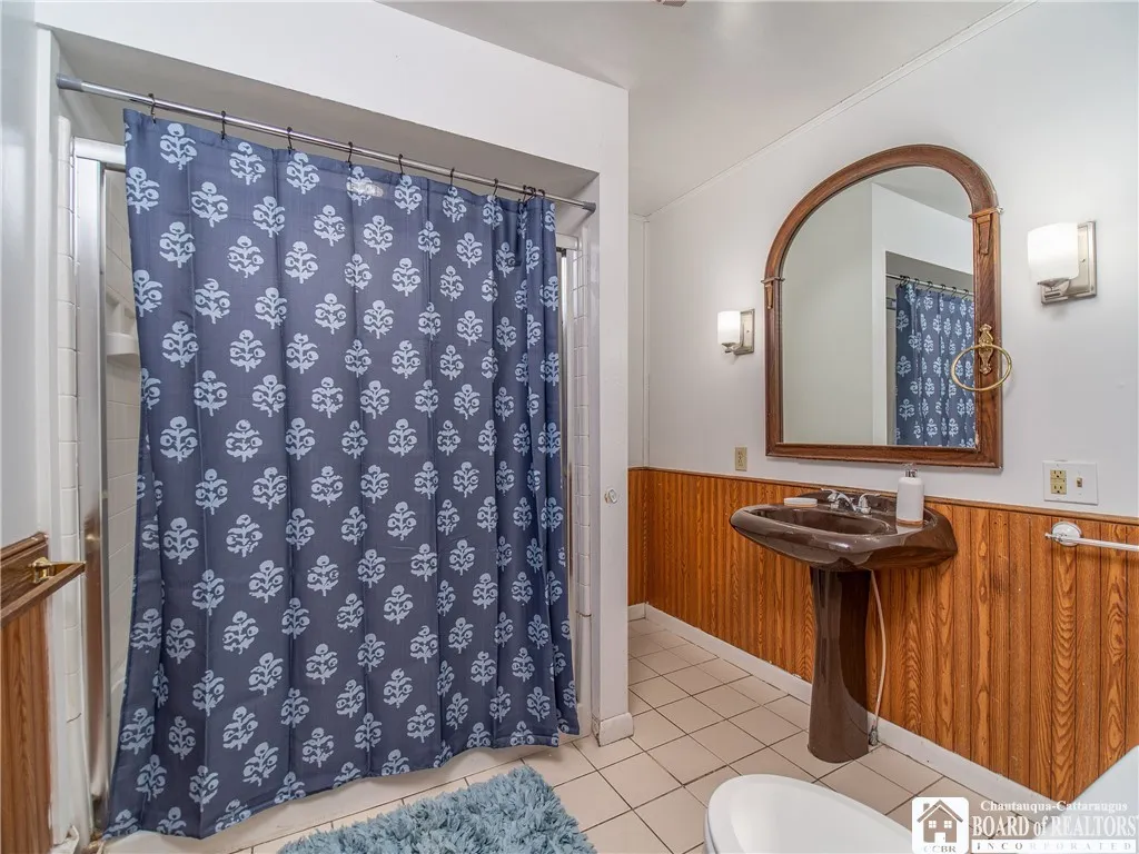 The full bathroom is located at the front of the home.