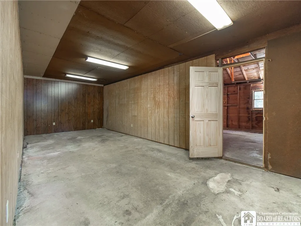 Pass through room from the main house to the garage.