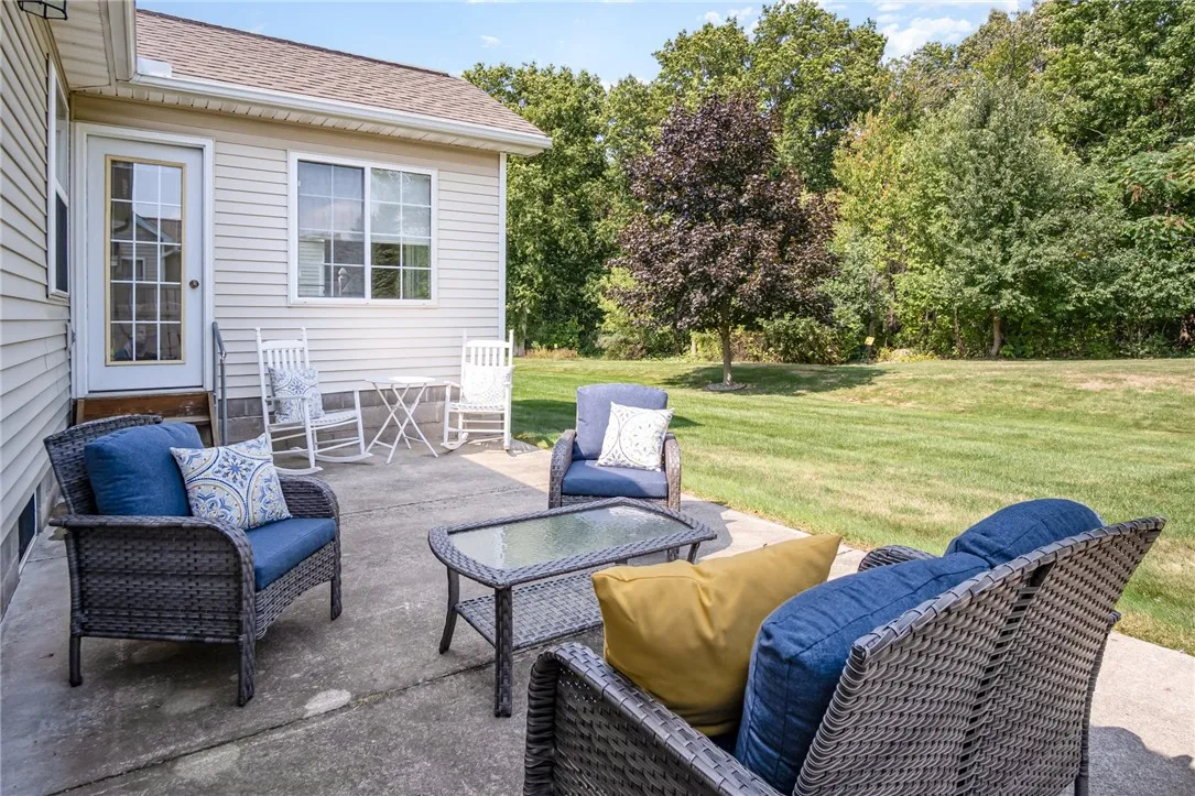 Sunroom Door Leads to Back Patio Area