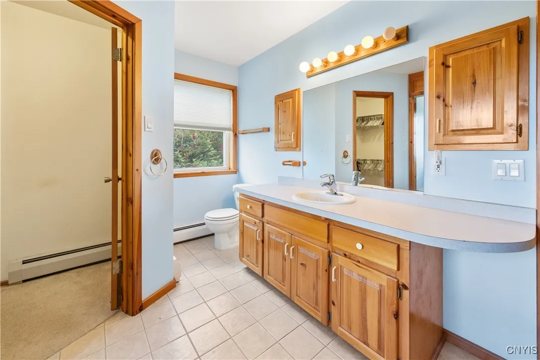 Primary Bathroom with two walk in closets