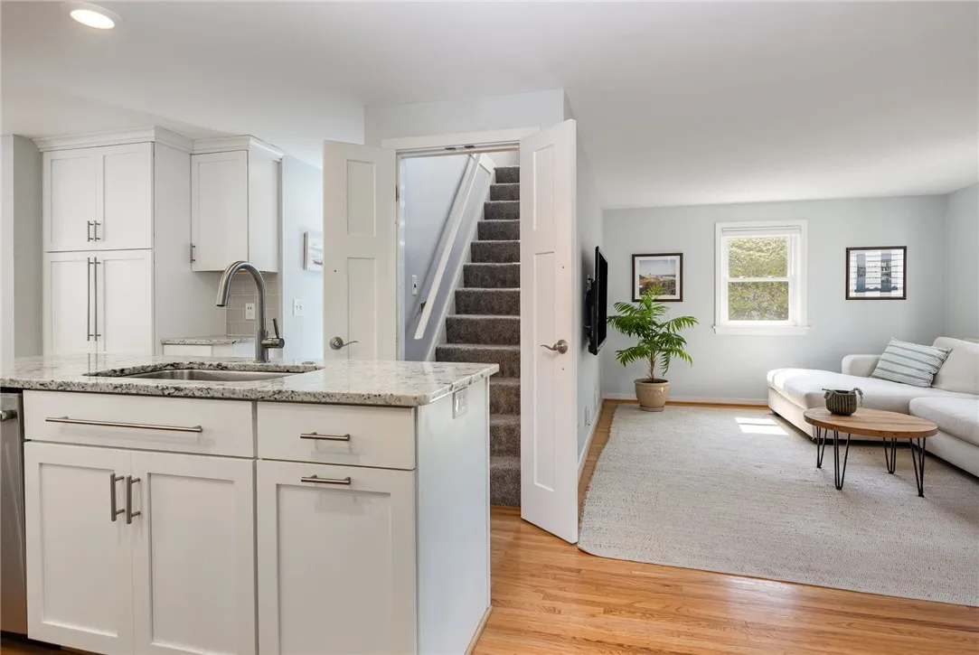 Kitchen open to living and dining room.