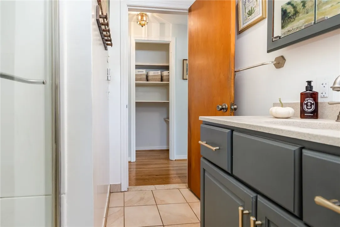 1st floor full bath - linen closet behind the door.