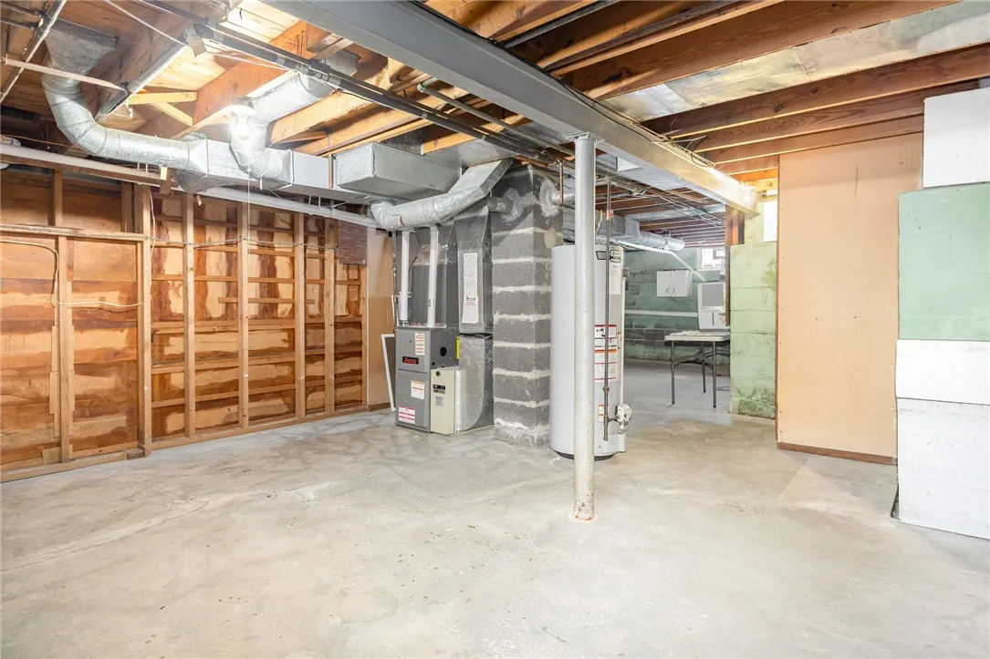 Utility room includes a double wide utility sink