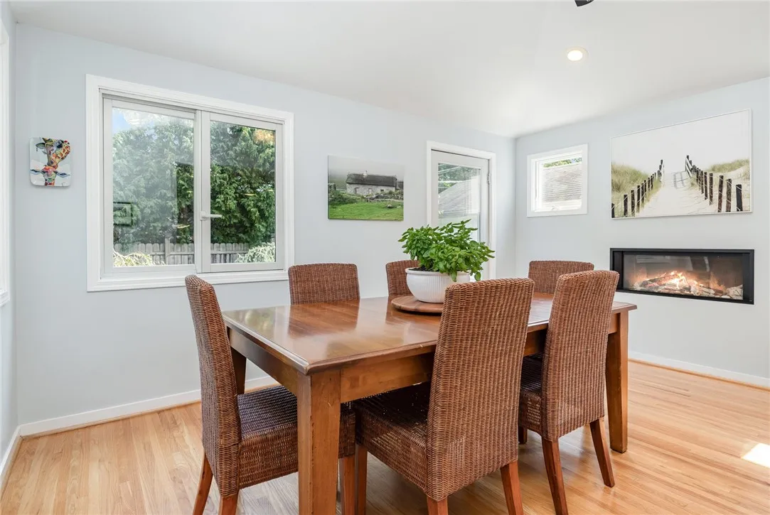 Dining Room with vaulted ceiling and modern gas fireplace