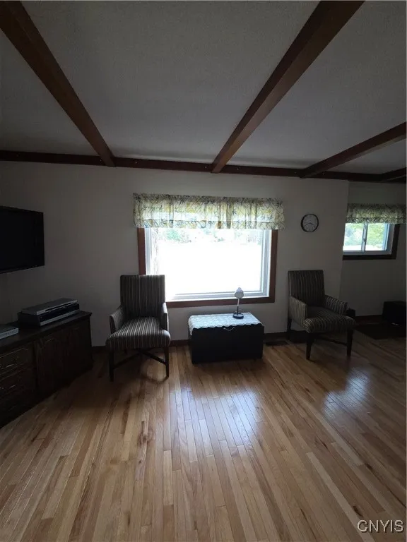 Large Living room.  Look at those hardwood floors.