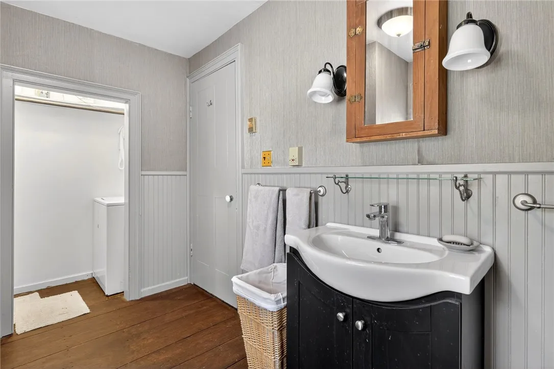 Different view of bath and laundry