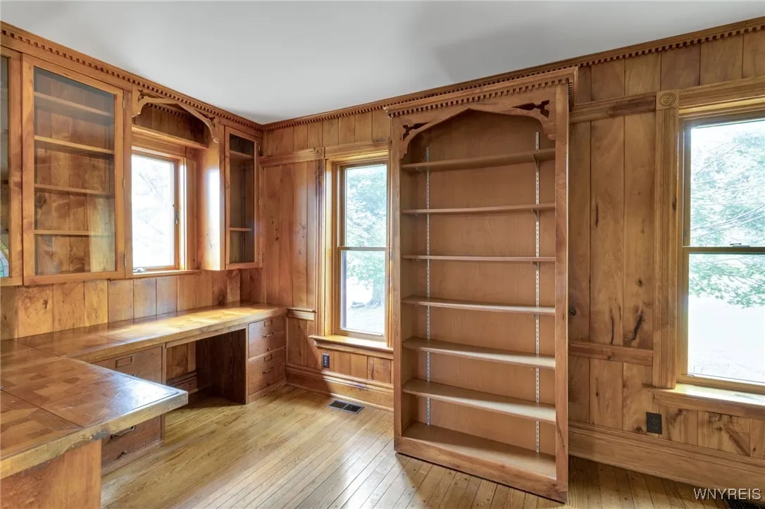 front room den with built in desk