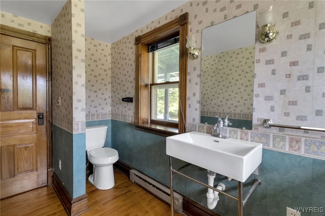 first floor half bath and laundry room