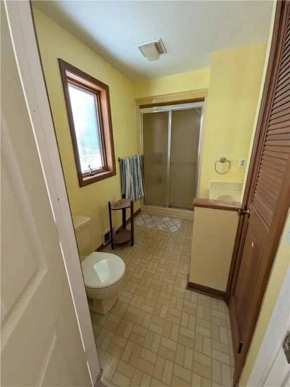 1st floor full bath located off the Family Room