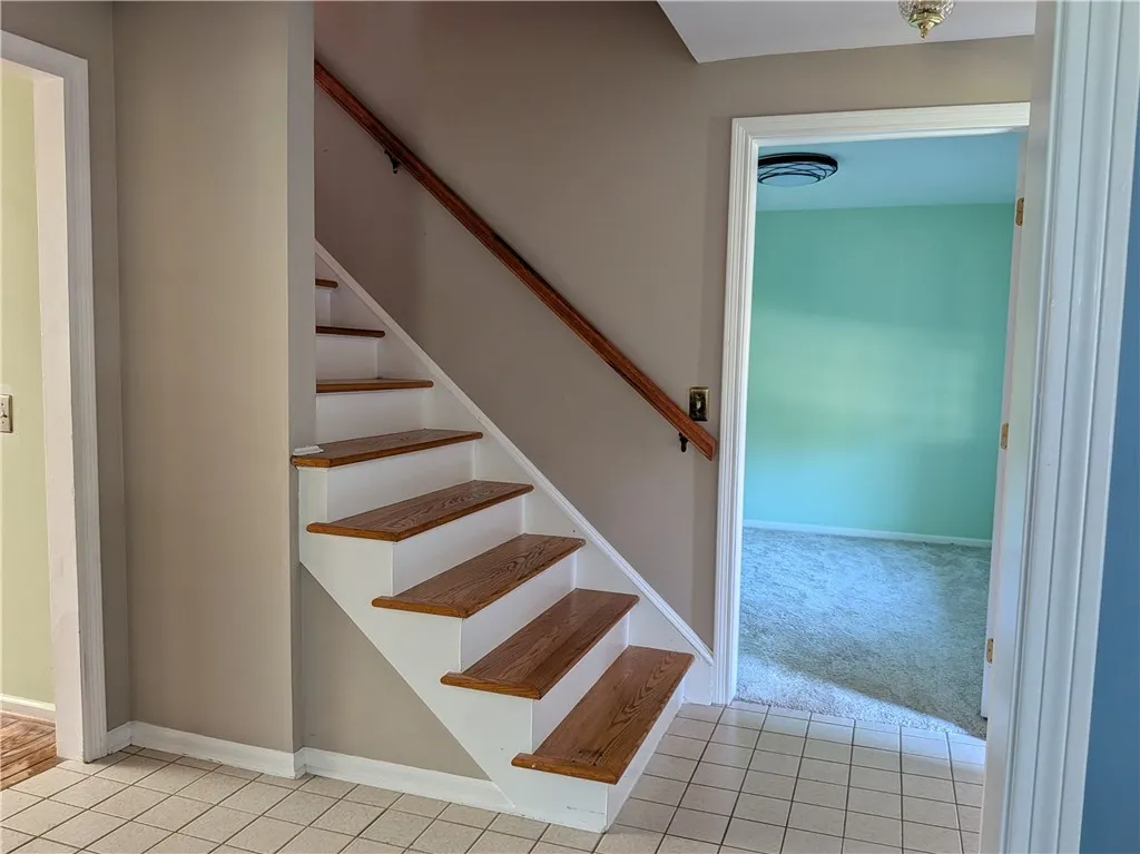 Stairs next to the bedroom