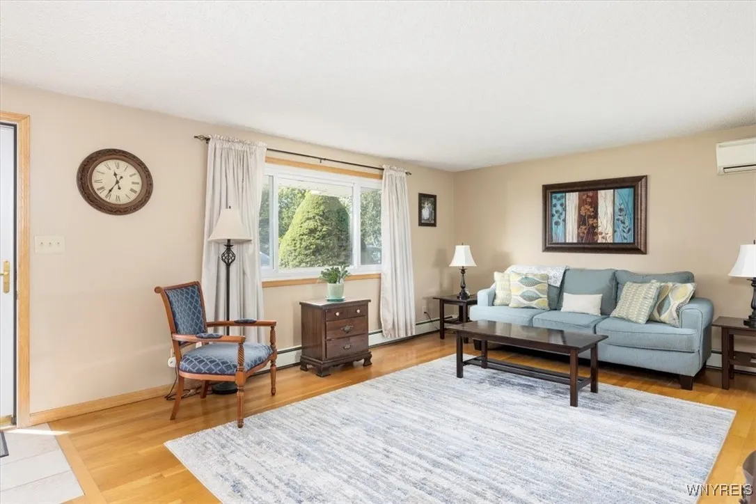 Hard wood floors with room for larger furniture.