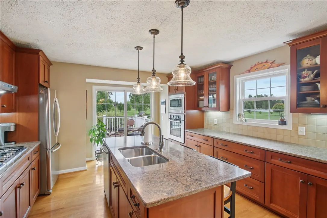 Cherry kitchen with quarts countertops