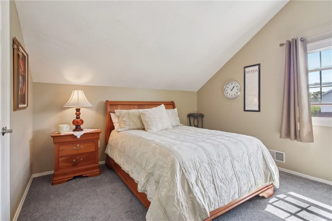 2nd floor bedroom with cathedral ceiling