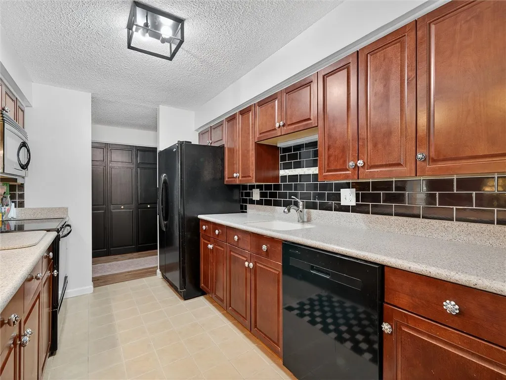 galley kitchen includes appliances