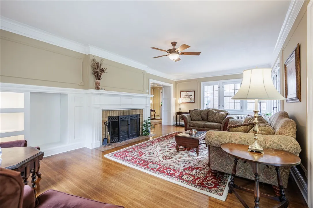 Great entertaining space with built in shelves and place to store wood for the fire.