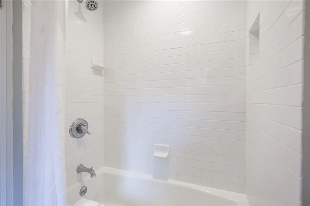 Modern shower/tub in Jack and Jill bath