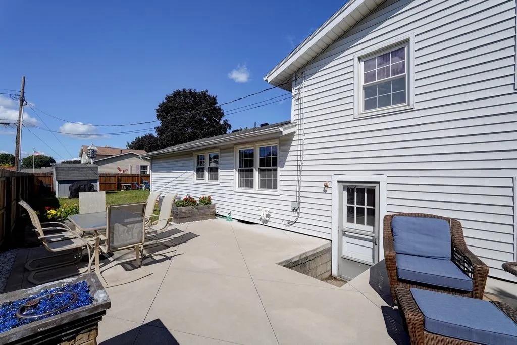 Easy egress from the utility room makes indoor/outdoor entertainment a breeze!