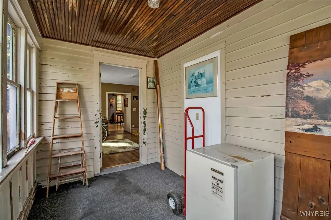 ENCLOSED FRONT PORCH
