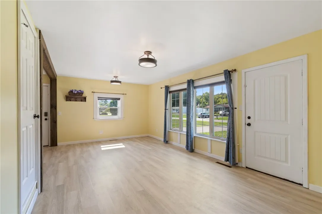 THE LIVING ROOM - oversized windows give you SO MUCH NATURAL LIGHT!