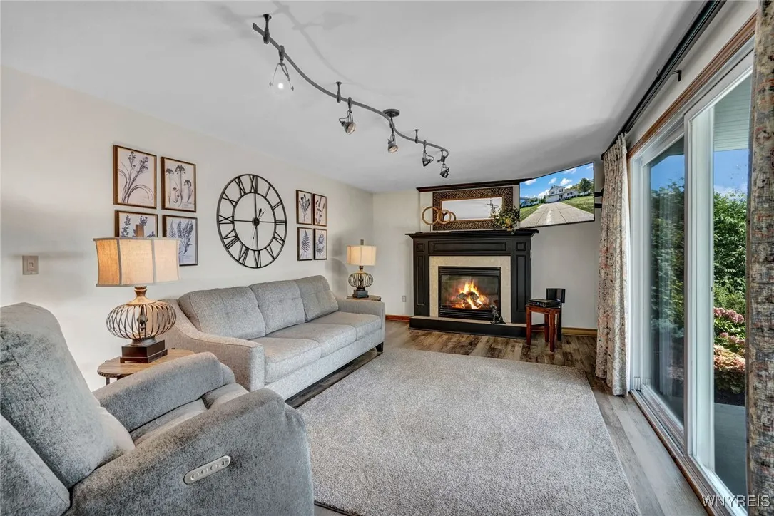 Family Room with Gas Fireplace - steps out on to covered back patio