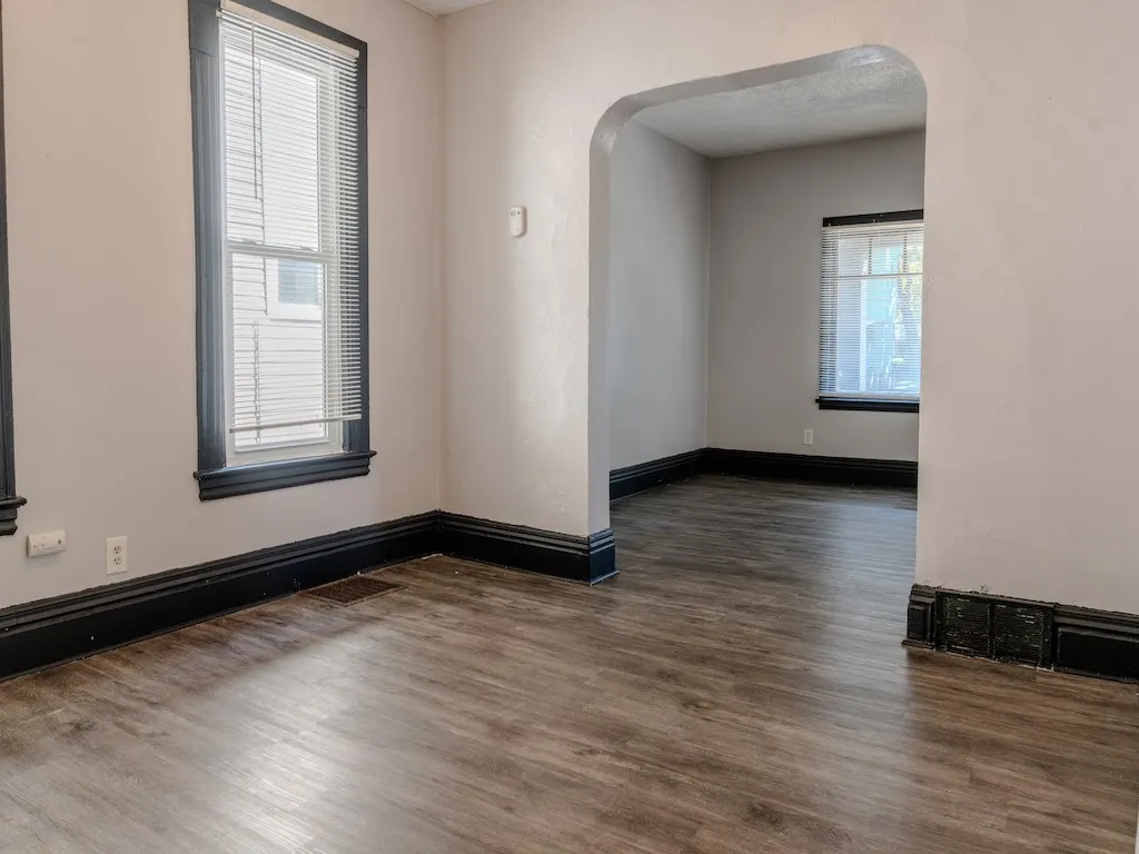 Formal dining room with vinyl flooring throughout the entire first floor