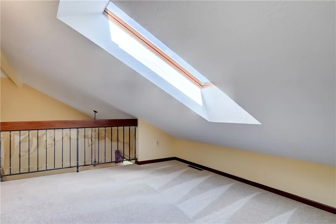 Loft,  11\' x 11\': Overlooks dining room, sloped ceiling with flexible space for storage, play, home office, or more.