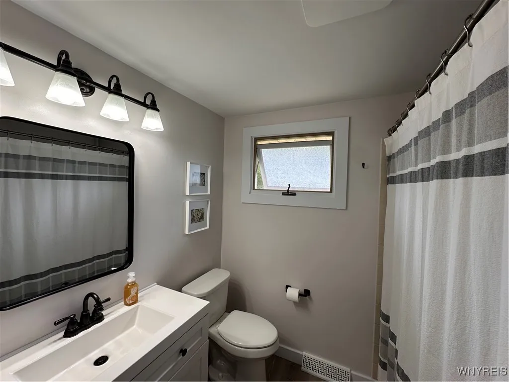 Main Bath with luxury plank vinyl​​‌​​​​‌​​‌‌​‌‌​​​‌‌​‌​‌​‌​​​‌​​ floor
