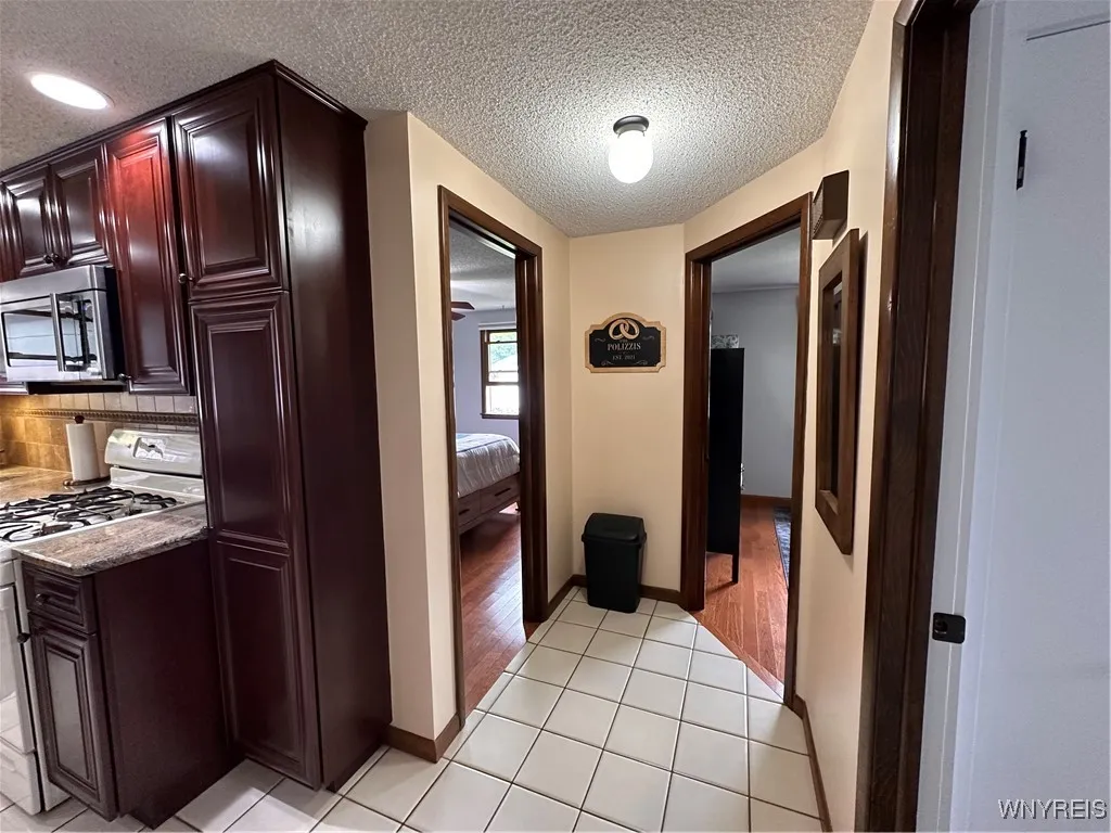 Hallway to bedrooms and bath