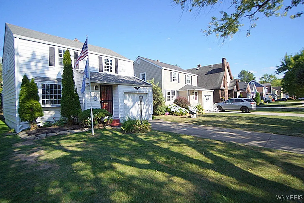 this is a quiet neighborhood street  with mature trees that you are dreaming of!