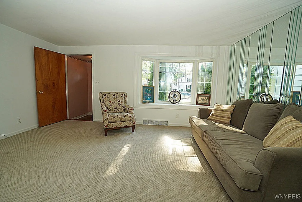 Bright spacious living room, with a lovely bay window