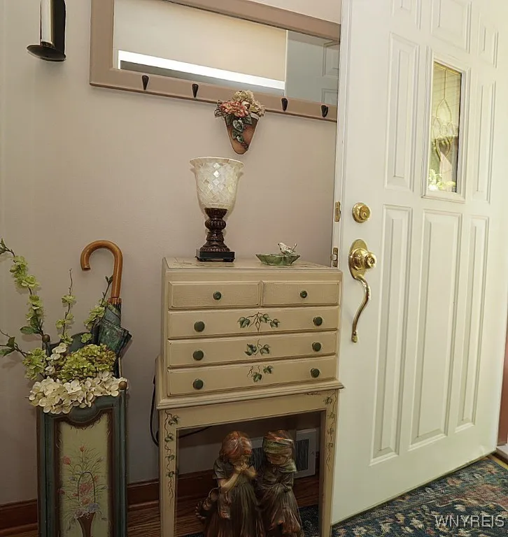 Enter into a charming front hall with closet