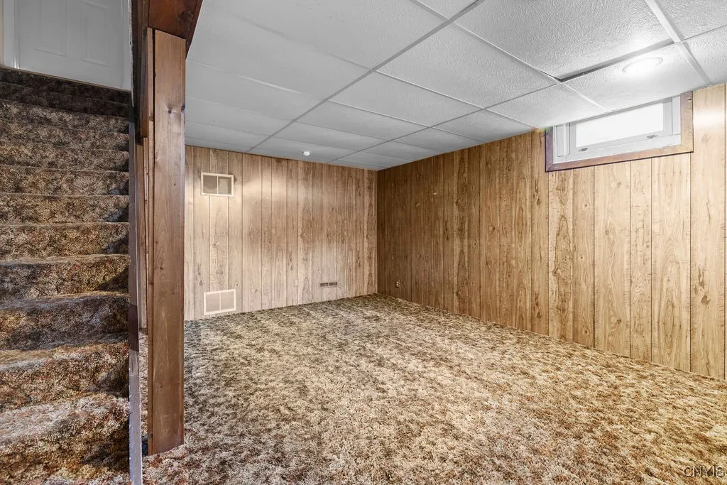 Partially finished lower level which can be used for a recreational area or a possibly 4th bedroom.