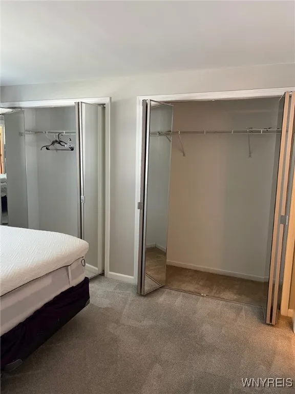 Primary bed room with double double closets!
